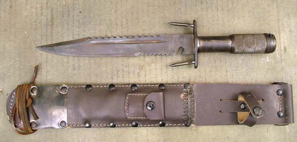 Knife outside of the sheath, with those